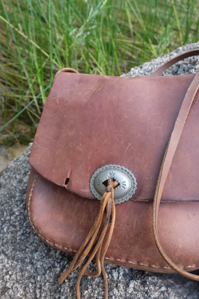 Leanna's vintage leather hippie bag