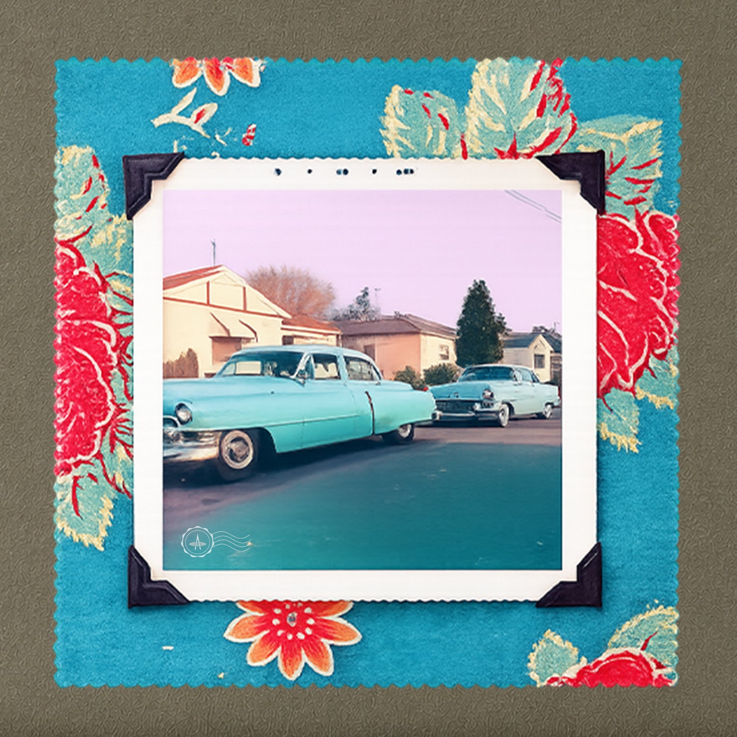 A t-shirt with a patch on the front of a vintage photo of two classic 50's cars framed in a floral fabric.