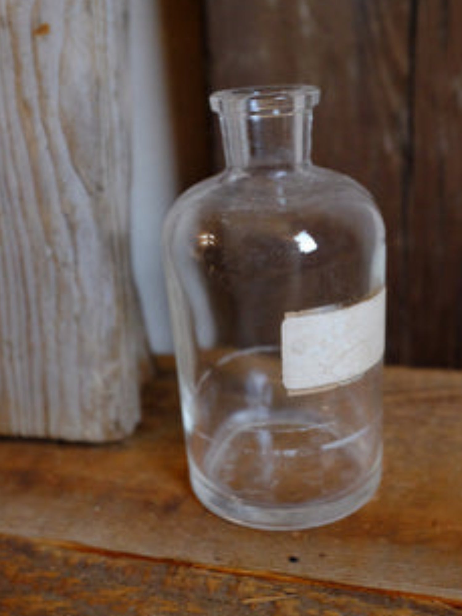 Vintage chemical bottles in various shapes and sizes