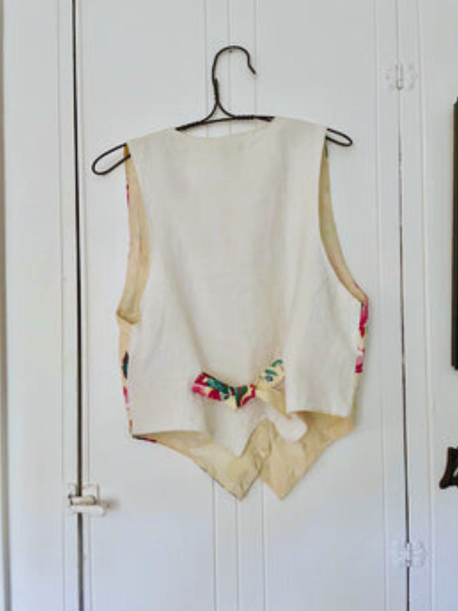 One-of-a-kind floral vest made from vintage 1940s drapery fabric.