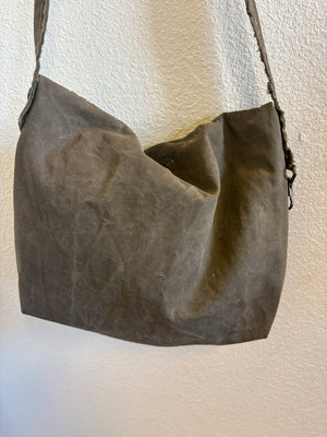 Back view of a WWII tent bag made of authentic canvas