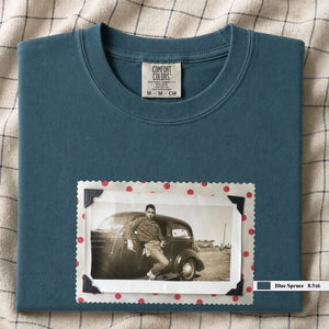 Blue Spruce colored folded t-shirt with a vintage 1930's snapshot of a boy and his holster in front of an old car.