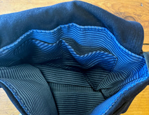 Blue pinstripe interior of a vintage handmade sailor collar bag