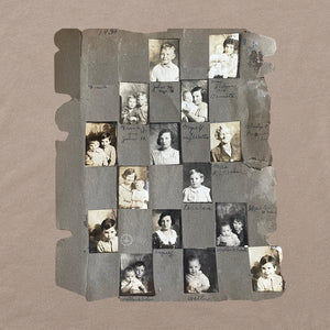 Page from a vintage photo album with family pictures