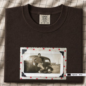 Espresso colored folded t-shirt with a vintage 1930's snapshot of a boy and his holster in front of an old car.