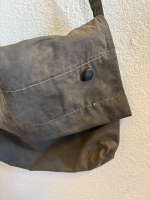 Detail stitching and hardware from a US army tent handmade bag