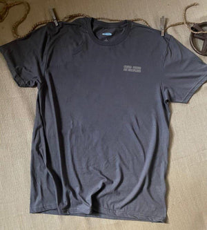 Front of collage art t-shirt with tagline on front: 'Cupid found me helpless'