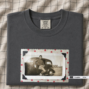 Graphite colored folded t-shirt with a vintage 1930's snapshot of a boy and his holster in front of an old car.