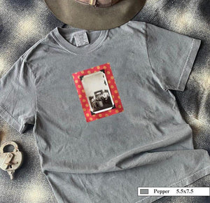 Grey t-shirt with vintage photo of musical band from 1920's era and orange polka dot border
