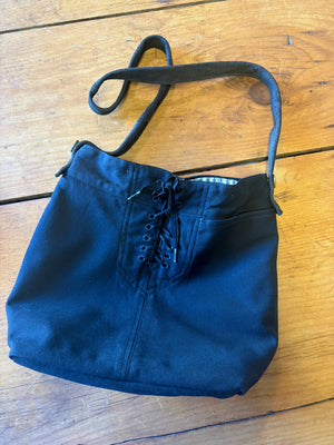Front of vintage uniform pants bag showing original lacing