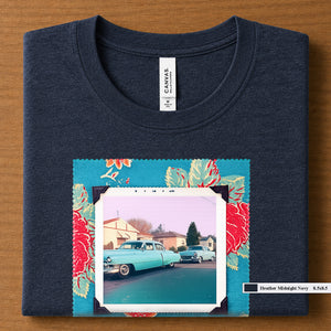 Heather Midnight Navy colored folded t-shirt with large a vintage photo of two classic 50's cars on the street. Photo is surrounded by floral fabric.