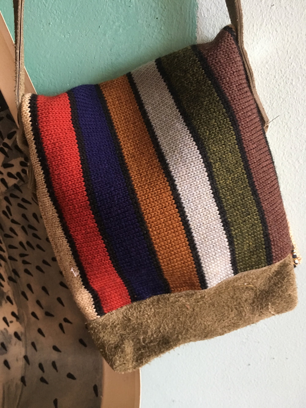 Striped vintage blanket and suede shoulder bag front