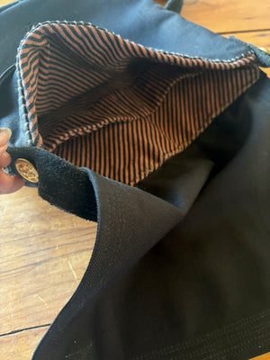 Interior striped fabric from a bag made from a vintage sailor uniform.