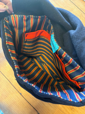 Interior view of striped fabric inside a US Navy vintage shirt collar uniform bag