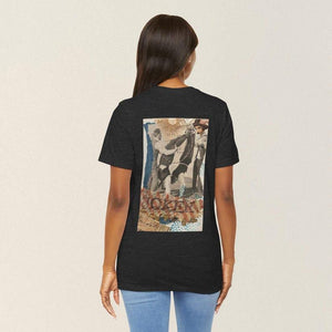 Model showing collage art t-shirt with image on back titled 'Joker'