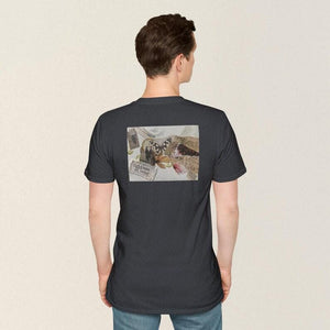 Model showing collage art t-shirt with image on back titled 'Lightness of Being'