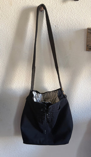 Front of a hand made bag from vintage navy pants