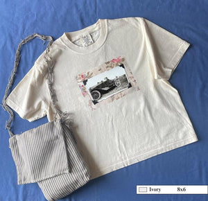 Ivory  t-shirt with striped bag and vintage snapshot of people riding in a 1920's car. 