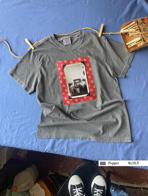 T-shirt front with vintage photo of old style traveling band.