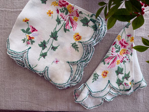 Vintage cloth napkins with scalloped edge folded