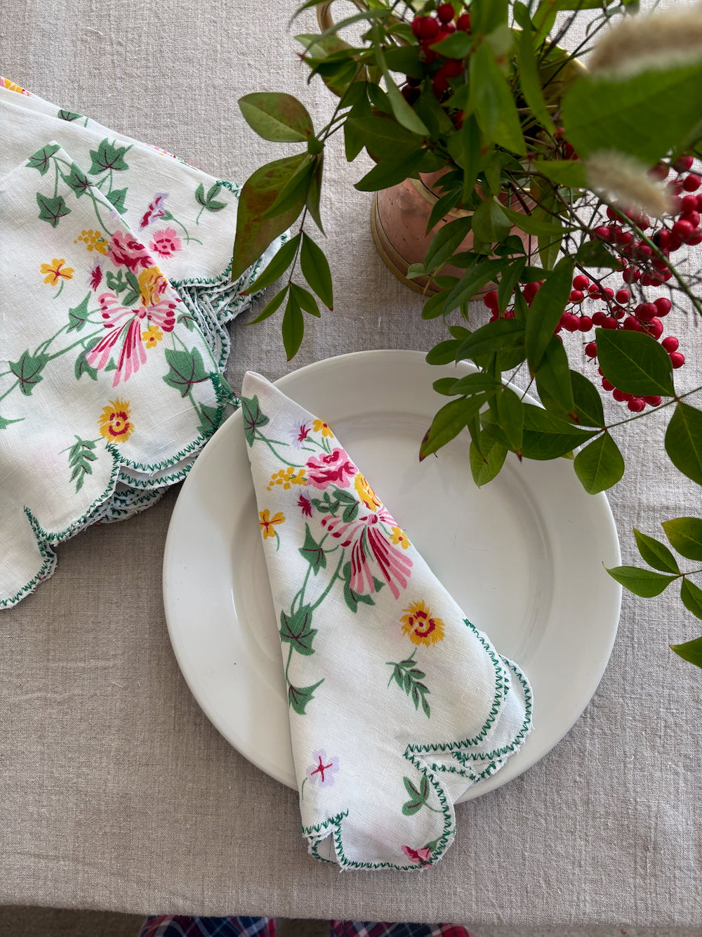 Vintage cloth napkin with scallop edge on plate