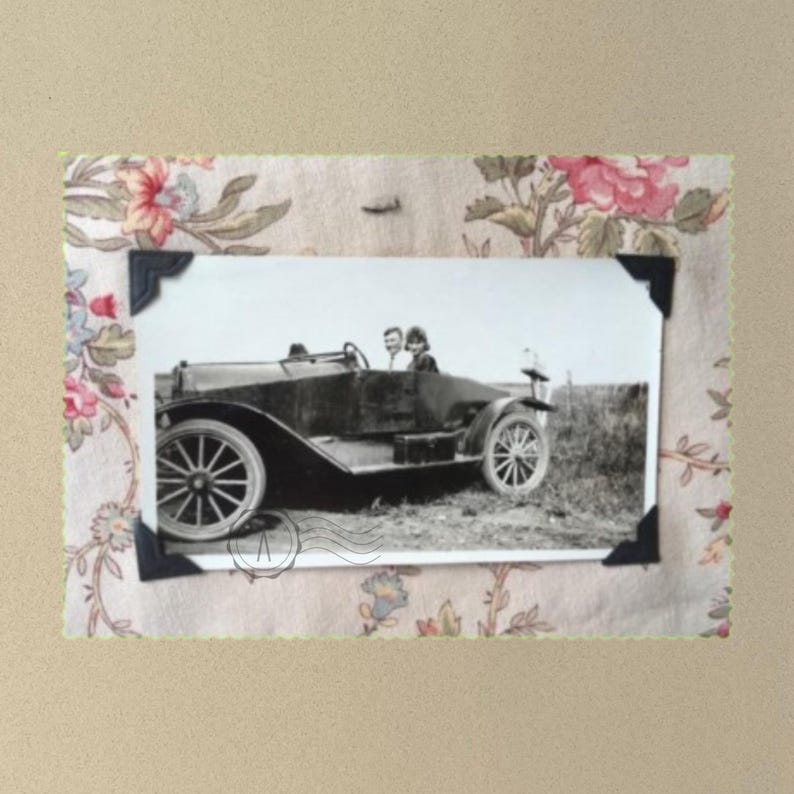 Grey t-shirt with denim jacket and vintage snapshot of people riding in a 1920's car. 