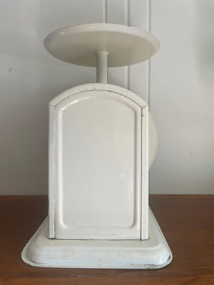 Back view of a vintage Chatillon dietary scale with white finish and decorative design.