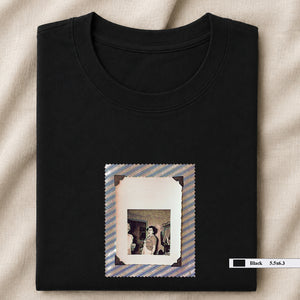 Black folded t-shirt with vintage photo of lady screaming