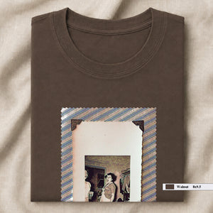 Brown folded t-shirt with large vintage photo of lady screaming