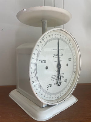 Vintage Chatillon dietary scale with white finish and decorative design.
