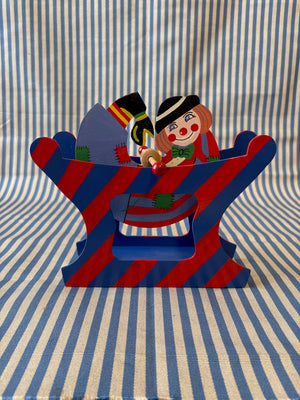 spinning clown toy back view