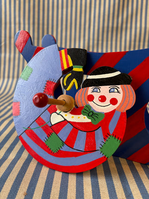 Spinning clown toy clown part view