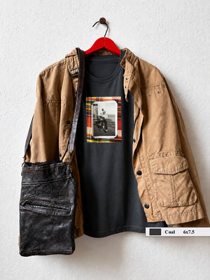 grey tee shirt with coat and small vintage photo of guitar player