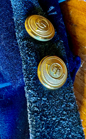 Detail buttons and suede strap on a vintage sailor collar handmade bag