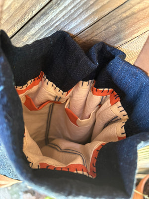 indigo cotton and brown leather cinch bag interior