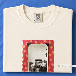 ivory colored folded t-shirt with large vintage photo of musicians playing