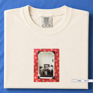ivory colored folded t-shirt with small vintage photo of musicians playing