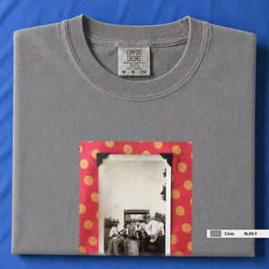 Light grey colored folded t-shirt with large vintage photo of musicians playing