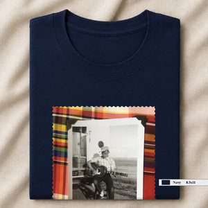 navy folded tee shirt with vintage photo of guitar player on front