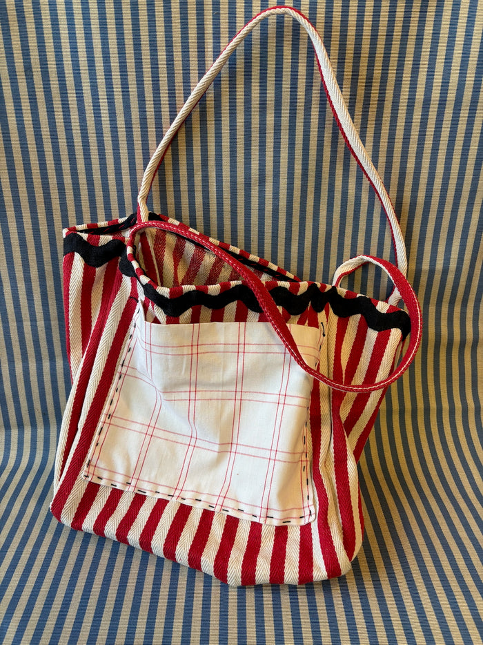Kasandra's red and white striped tote bag