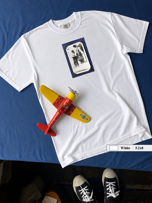 White t-shirt with vintage photo of kids posing for a photo