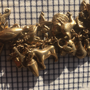 Vintage chubby charm necklace with antique jewelry design