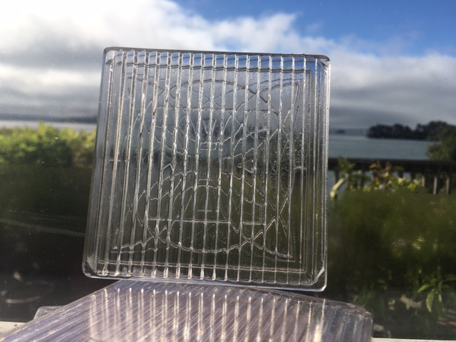 Vintage Chicago glass street tiles with architectural salvage.