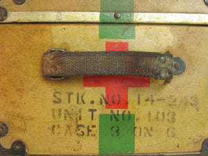 Vintage Red Cross suitcase with military collectible design.
