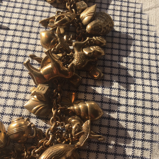 Vintage chubby charm necklace with antique jewelry design