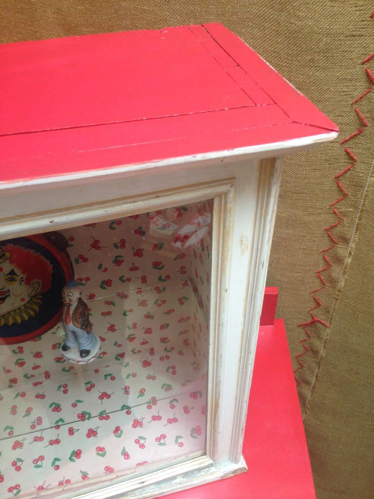 Vintage one-door cherry display cabinet with original glass and exterior paint.