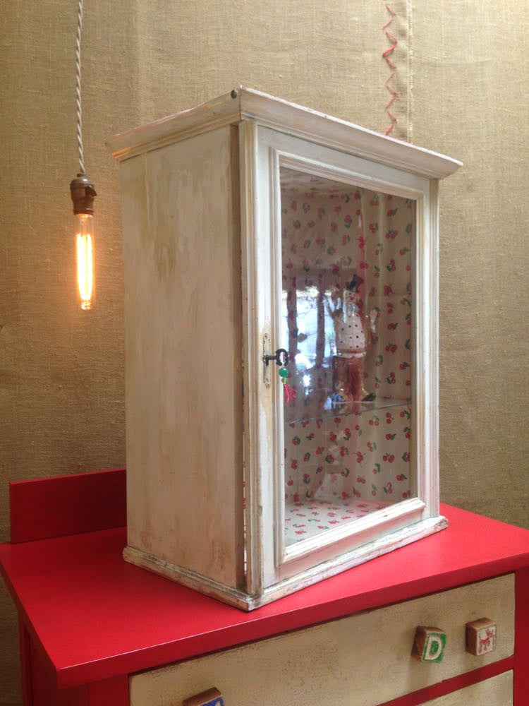 Vintage one-door cherry display cabinet with original glass and exterior paint.
