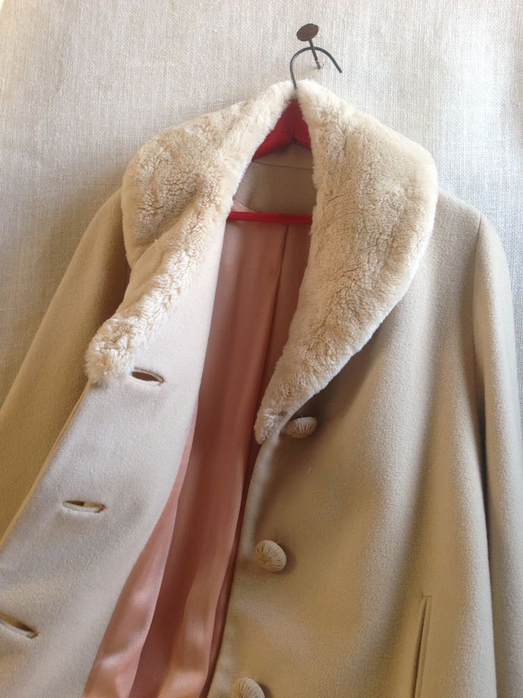 Vintage fur-collar coat with mid century winter fashion design.