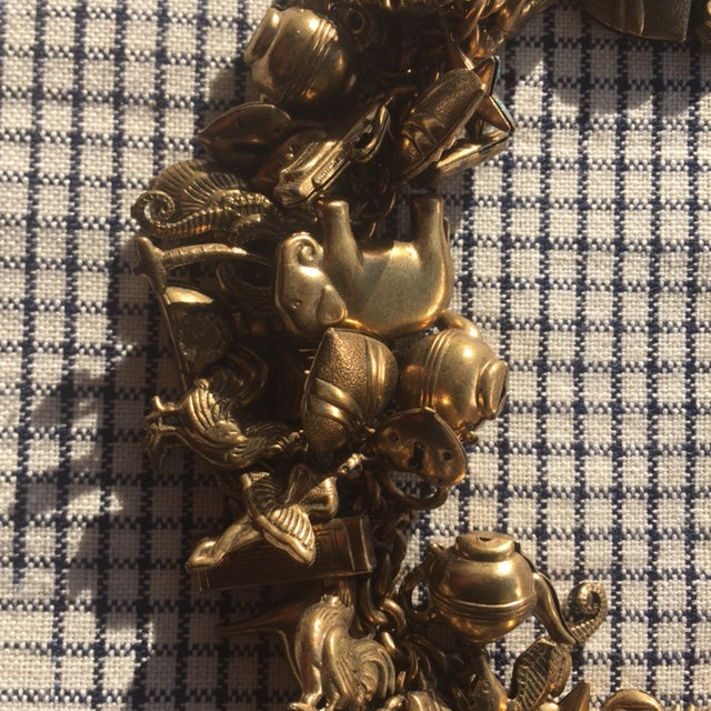 Vintage chubby charm necklace with antique jewelry design