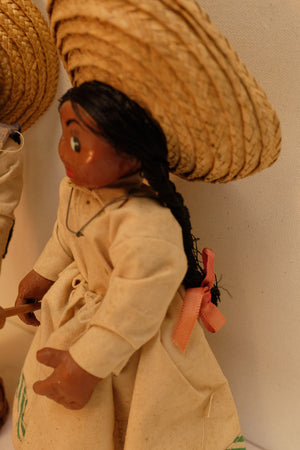Vintage folklore dolls from the 1950s with original clothing and accessories.